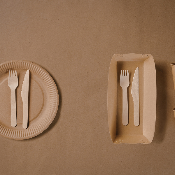 brown plates with fork and knife on left and square plate with fork and knife on right