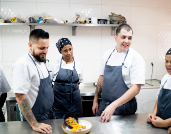 a meeting in a kitchen