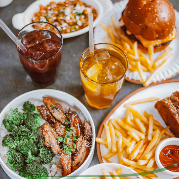 Burger with fries and beverages