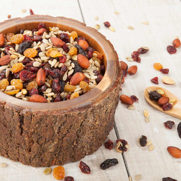 Acacia bowl holding food.