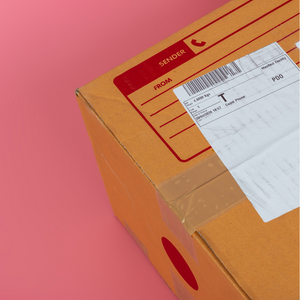 shipping box on pink background