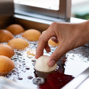 Drop donuts being made