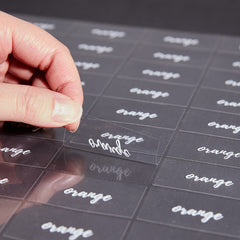 Label Tek Plastic Orange Label - Clear with White Font, Water-Resistant - 2