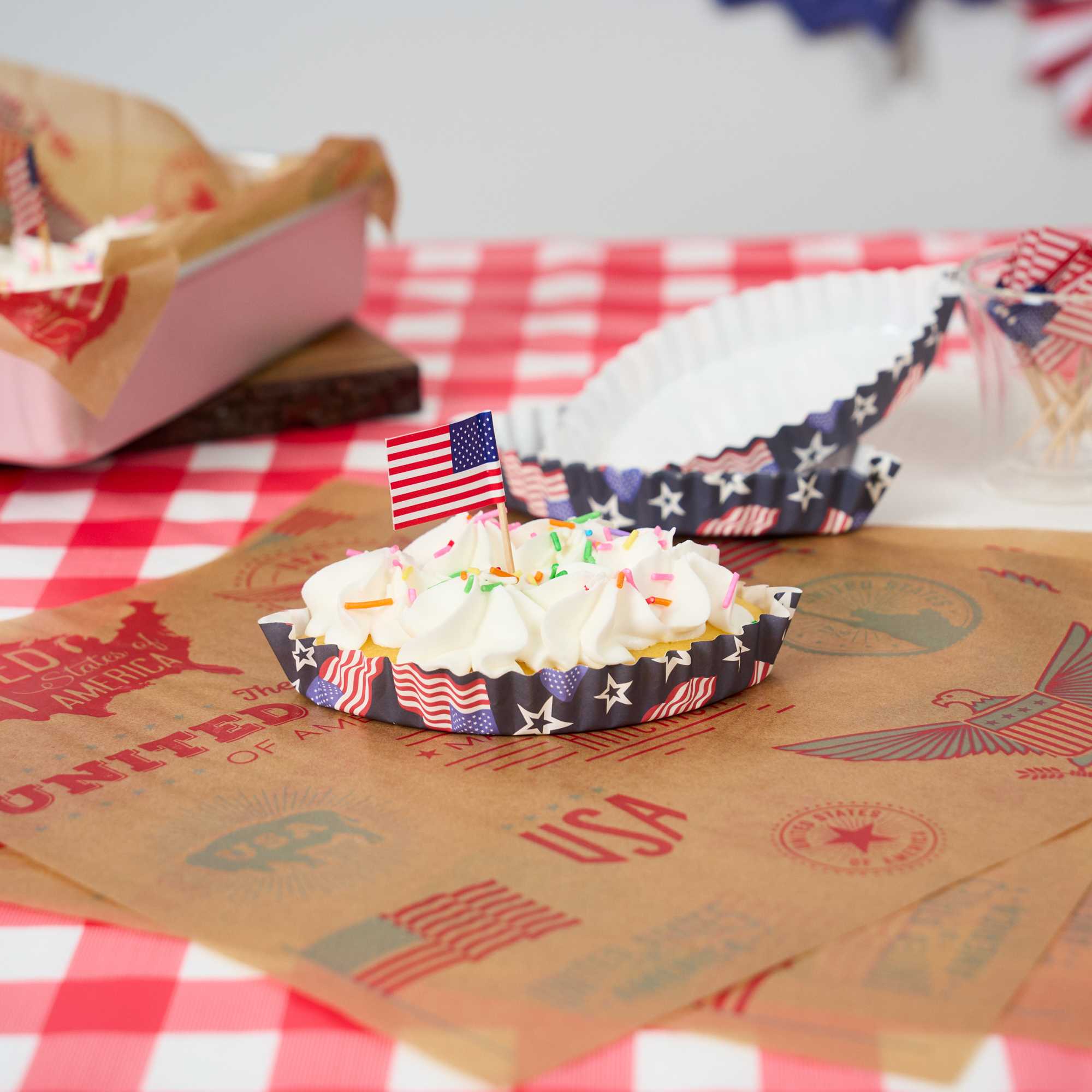 Panificio 5.4 oz Leaf Paper Baking Cup - American Flag, Ridged, Greaseproof - 4" x 3 1/4" x 3/4" - 4000 count box