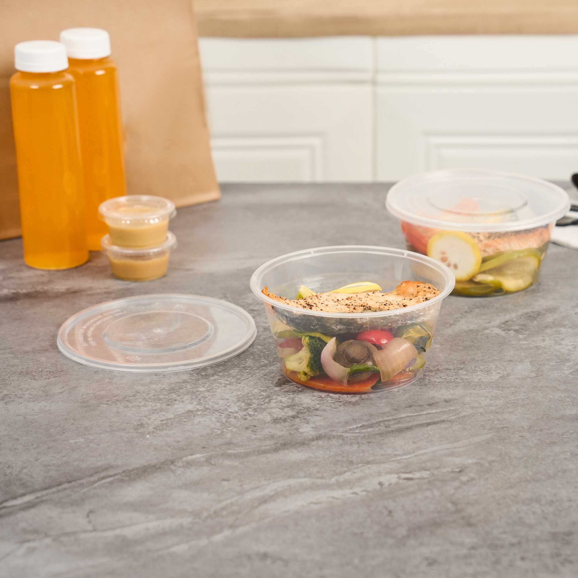 SustainaLite 27 oz Round Clear Plastic Food Container - with Lid, Microwavable - 6" x 6" x 3" - 50 count box