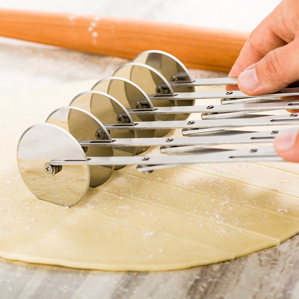Met Lux Stainless Steel 6-Wheel Pastry Cutter - 2 1/4" Blades - 9 1/2" x 9 1/2" x 2 1/4" - 1 count box