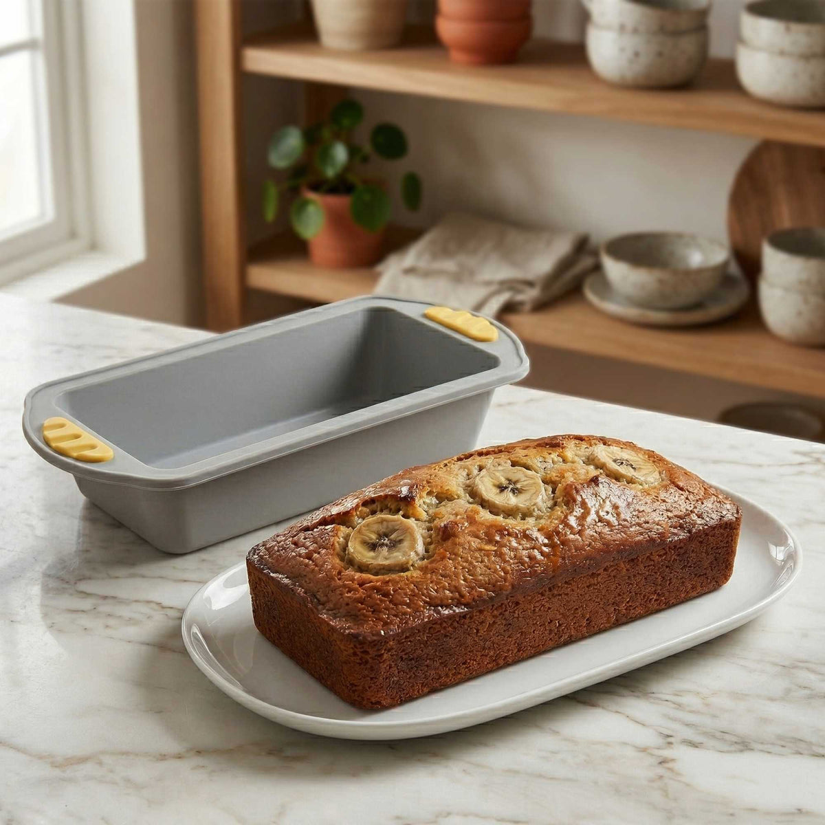 Pastry Tek Gray Silicone Bread Loaf Pan - Non-Stick, with Handles - 9 1/4" x 5 1/2" x 2 1/4" - 1 count box