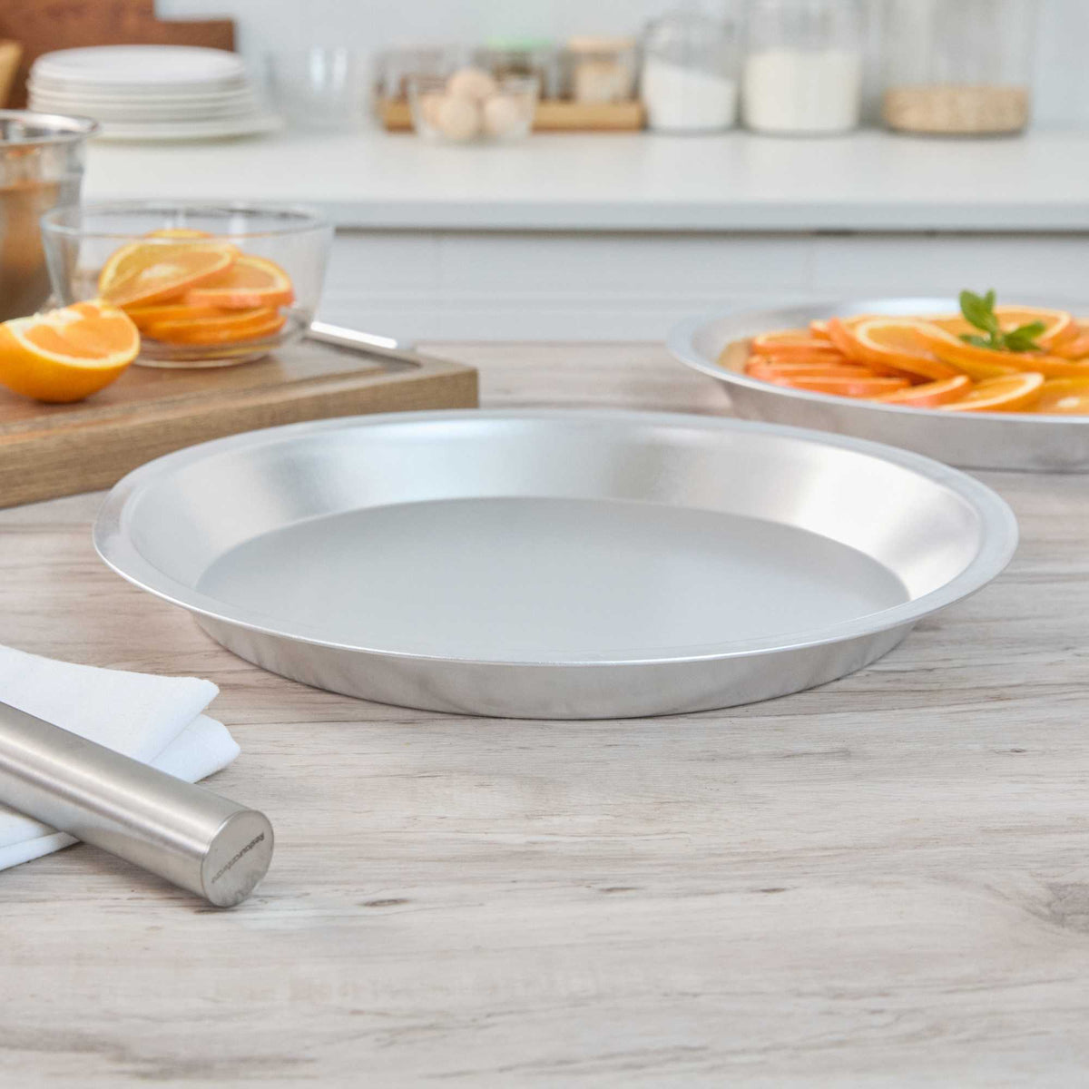 Pastry Tek 18 Gauge Aluminum Pie Pan - 12" x 12" x 1 1/4"- 1 count box