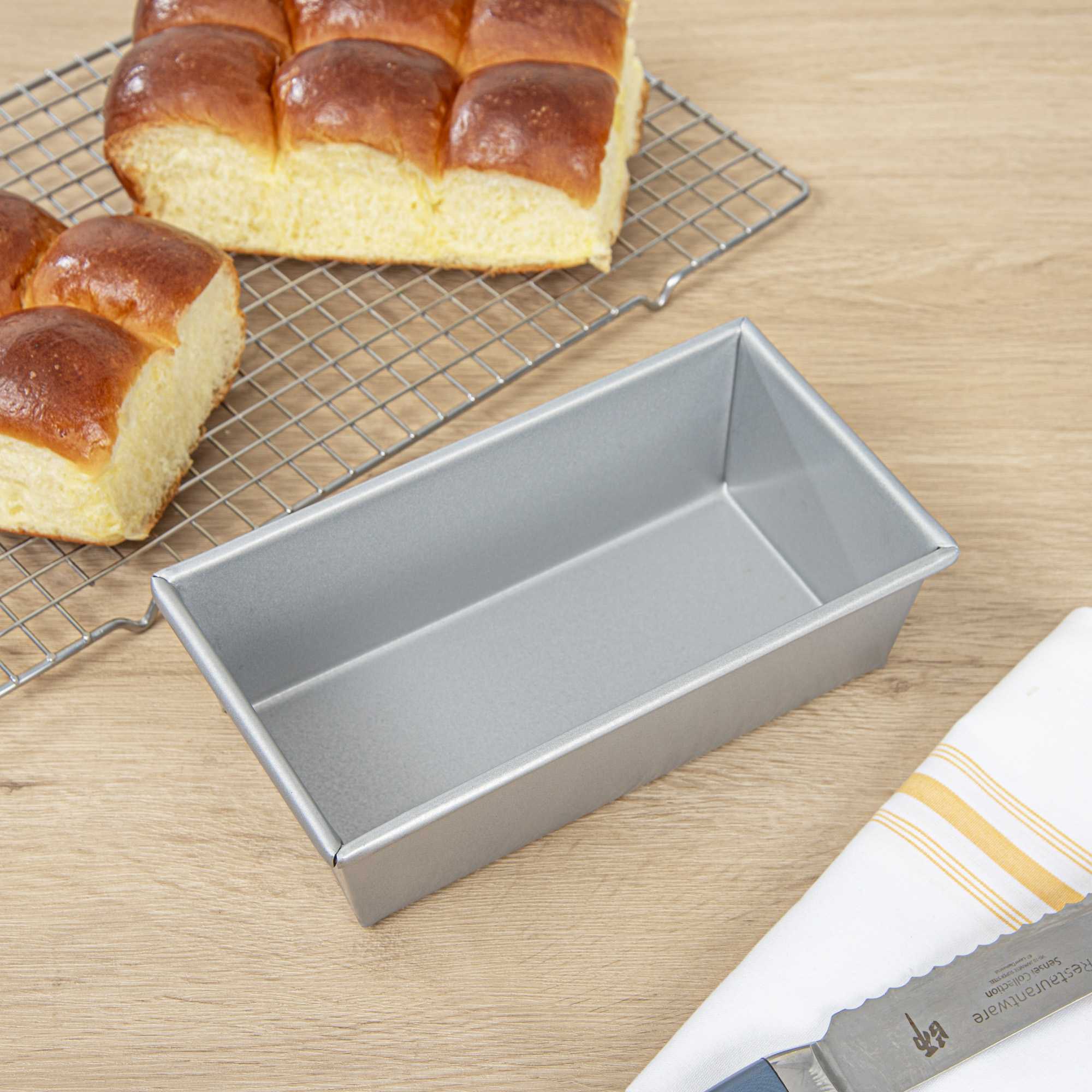 Pastry Tek 1 lb Glazed Aluminized Steel Bread Loaf Pan - 9" x 5" x 2 3/4" - 24 count box