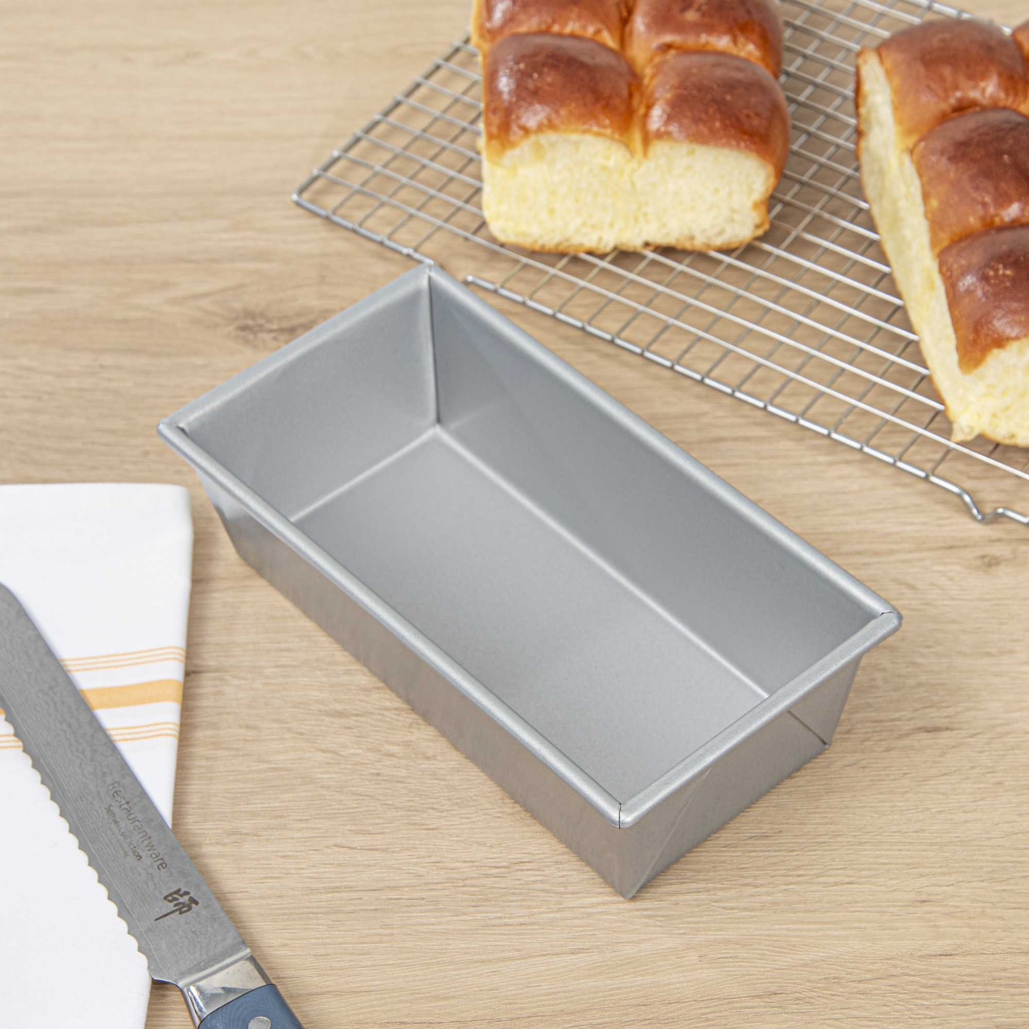 Pastry Tek 1 lb Glazed Aluminized Steel Bread Loaf Pan - 9 3/4" x 5" x 3" - 24 count box