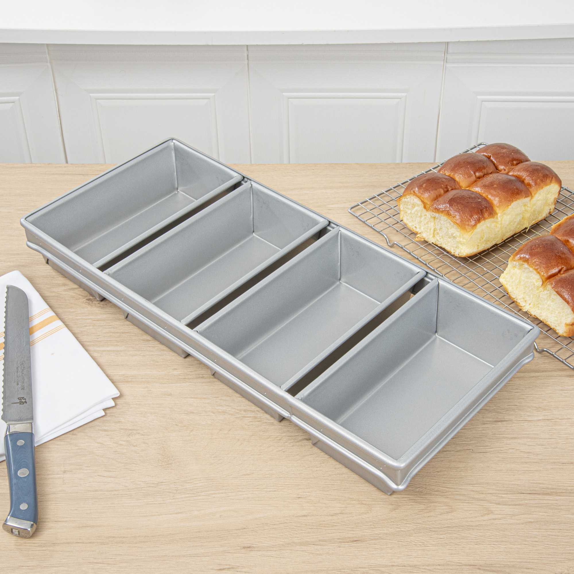 Pastry Tek 1 lb Glazed Aluminized Steel Bread Loaf Pan - 4 Strap - 22" x 9 3/4" x 3" - 6 count box