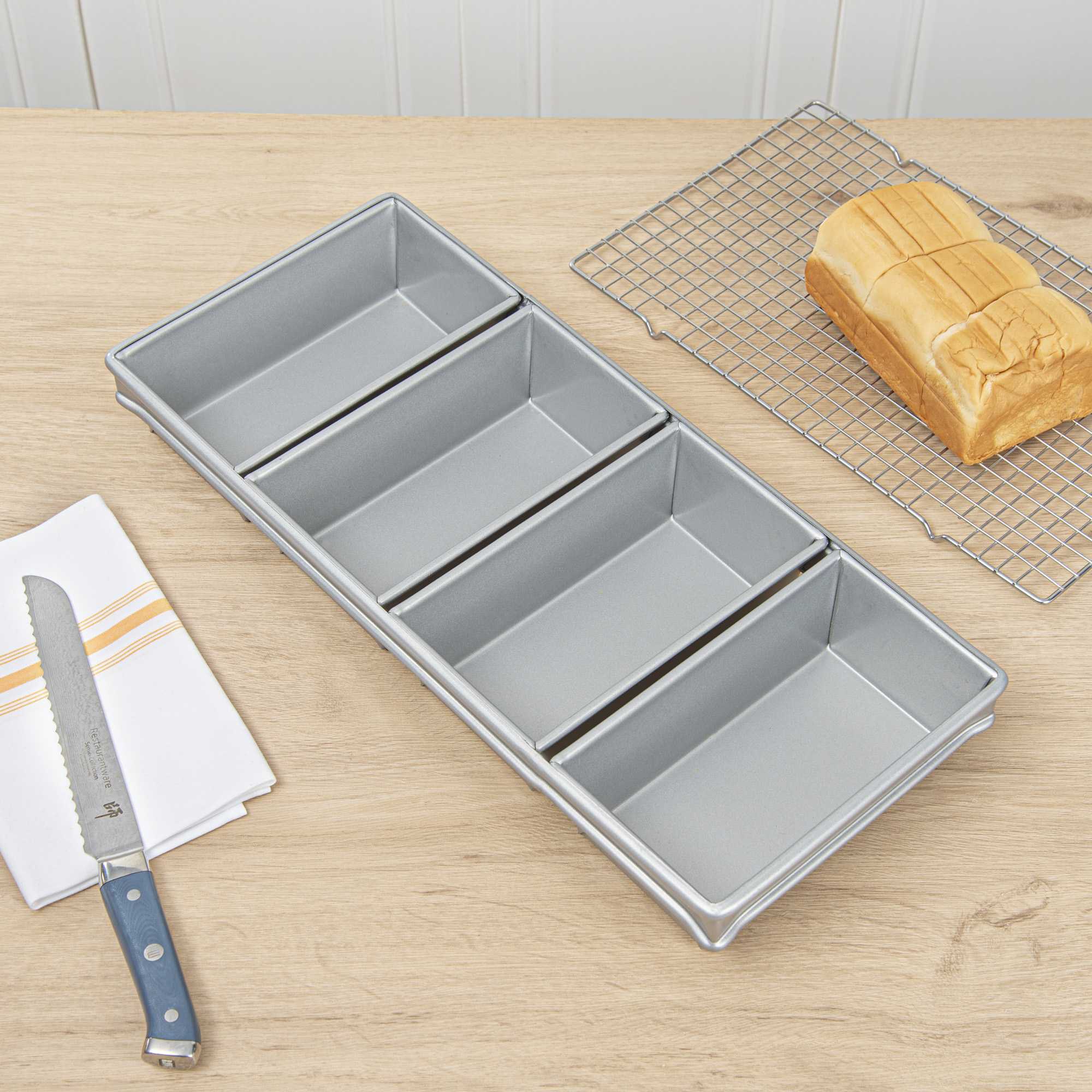 Pastry Tek 1 lb Glazed Aluminized Steel Bread Loaf Pan - 4 Strap - 20 3/4" x 9 1/4" x 3" - 6 count box