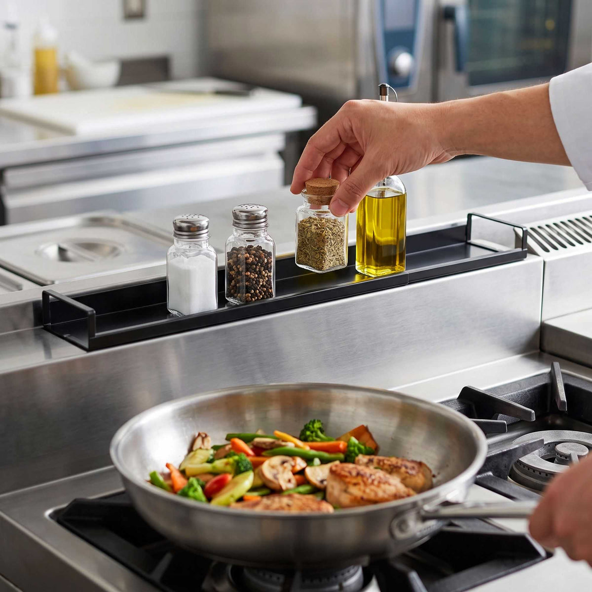 Chef 101 Black Carbon Steel Stove Top Shelf - Extendable, with 4 Magnets and 4 Adhesive Pads - 16 1/4" x 4 1/4" x 1 1/2" - 1 count box
