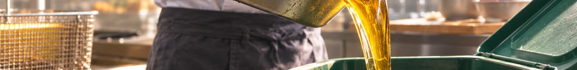 Cook pouring used fryer oil into a recycling container, showing the benefits of recycling cooking oil
