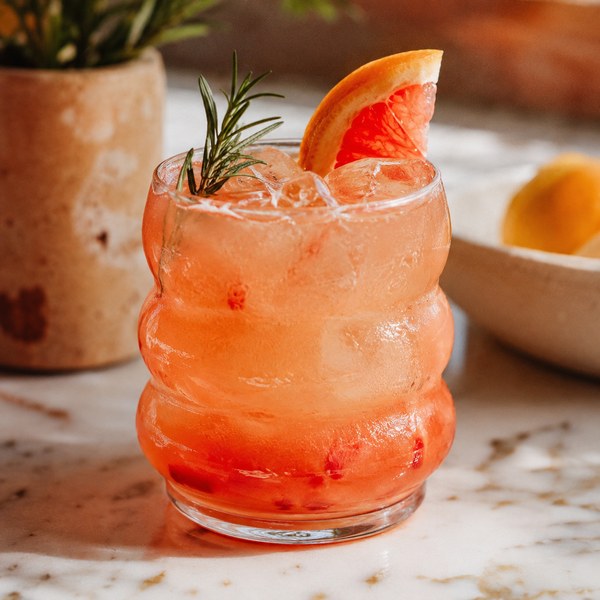 Signature drink served in distinctive glassware showing how presentation supports food and beverage marketing strategies