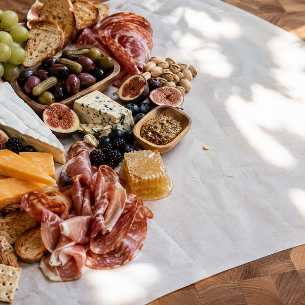 Charcuterie grazing board picnic food ideas for a luxury catered picnic