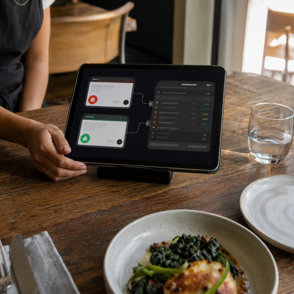 Tablet showing DoorDash and Uber Eats orders flowing automatically into a restaurant POS