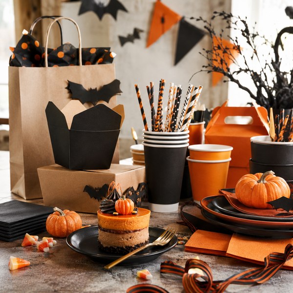 Halloween paper cups, bat picks, and candy bags — supplies for restaurant Halloween promotions