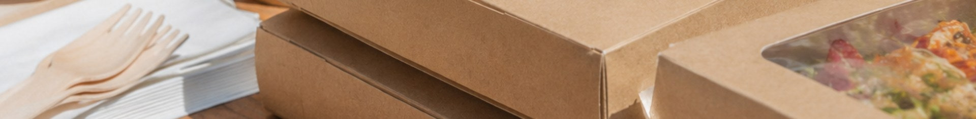 Disposable serving ware and take-out packaging staged for a pop-up restaurant event