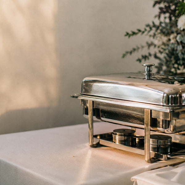 Stainless steel chafing dishes with fuel — essential catering equipment for buffet service
