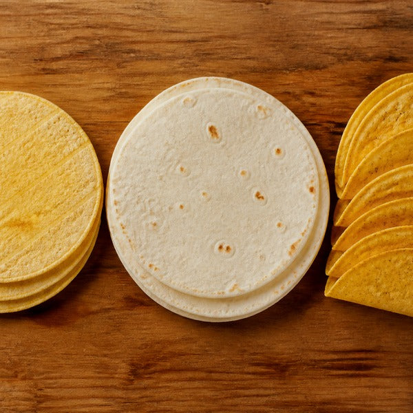 Corn tortillas, flour tortillas, and hard taco shells compared side by side for taco service