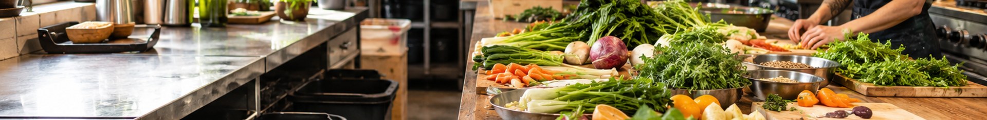 Zero waste restaurant kitchen with sorted compost bins and whole-ingredient prep station